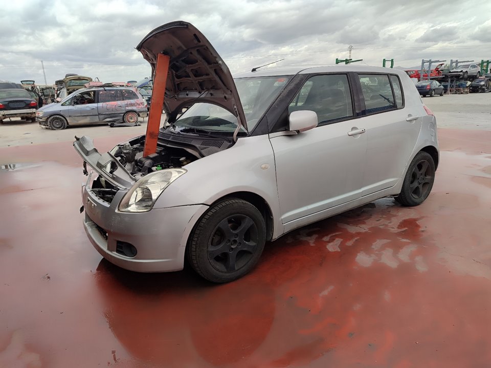 SUZUKI Swift 3 generation (2004-2010) Решетка бампера передняя левая 7175163J 25246359