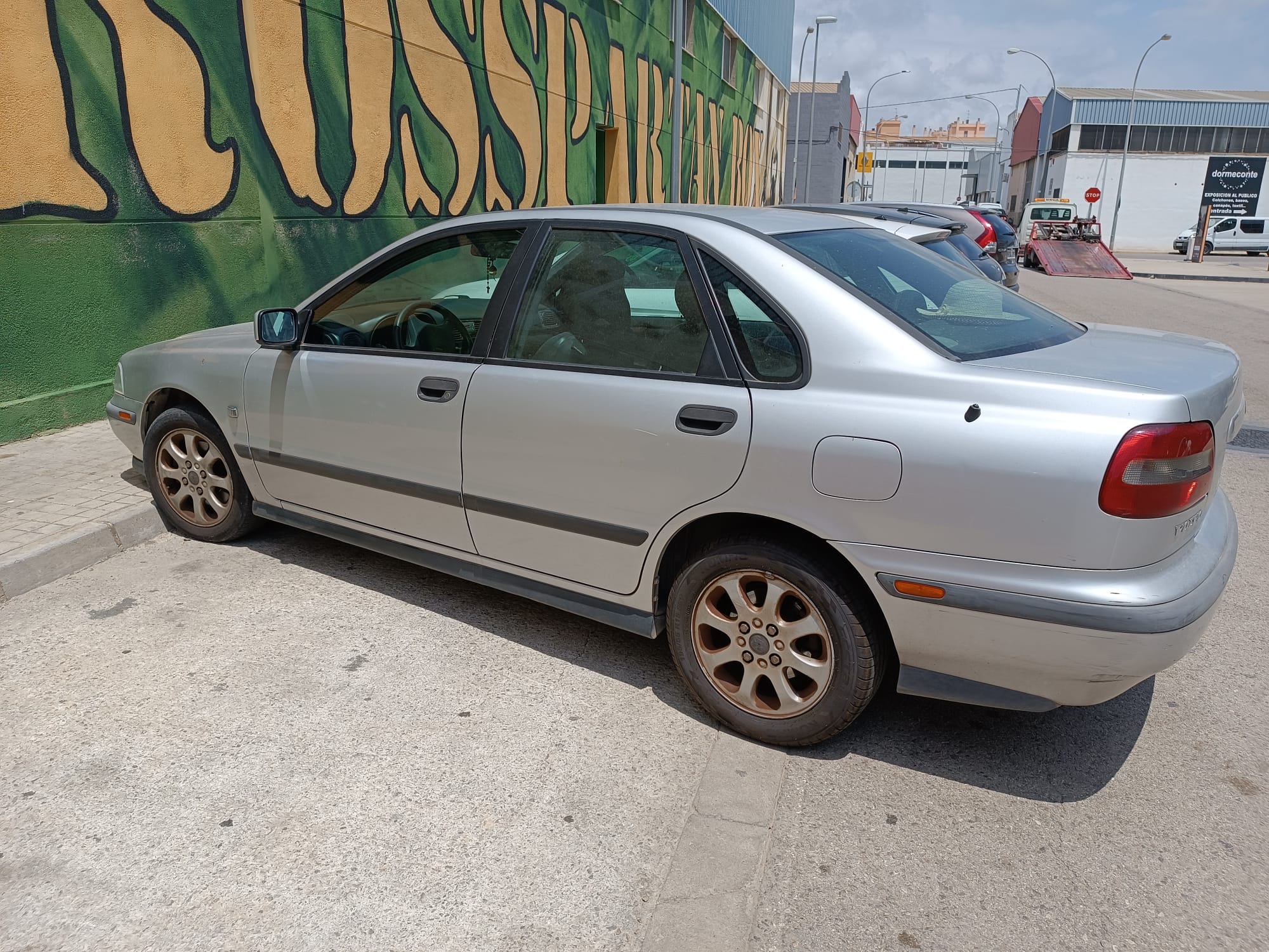 VOLVO S40 1 generation (1996-2004) Priekinių kairių durų stiklo pakelėjas 113137101 24811709