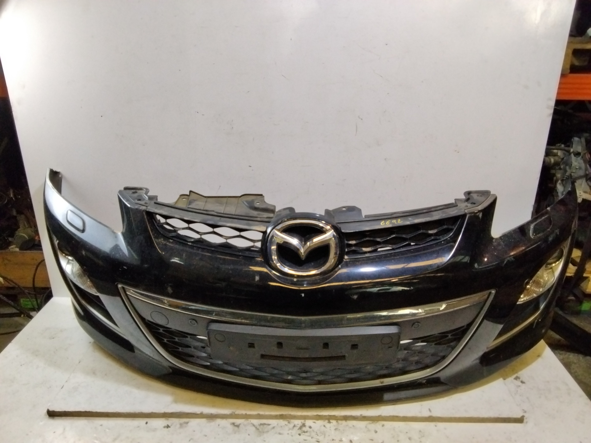 MAZDA CX-7 1 generation (2006-2012) Бампер передний NOREF 25266914