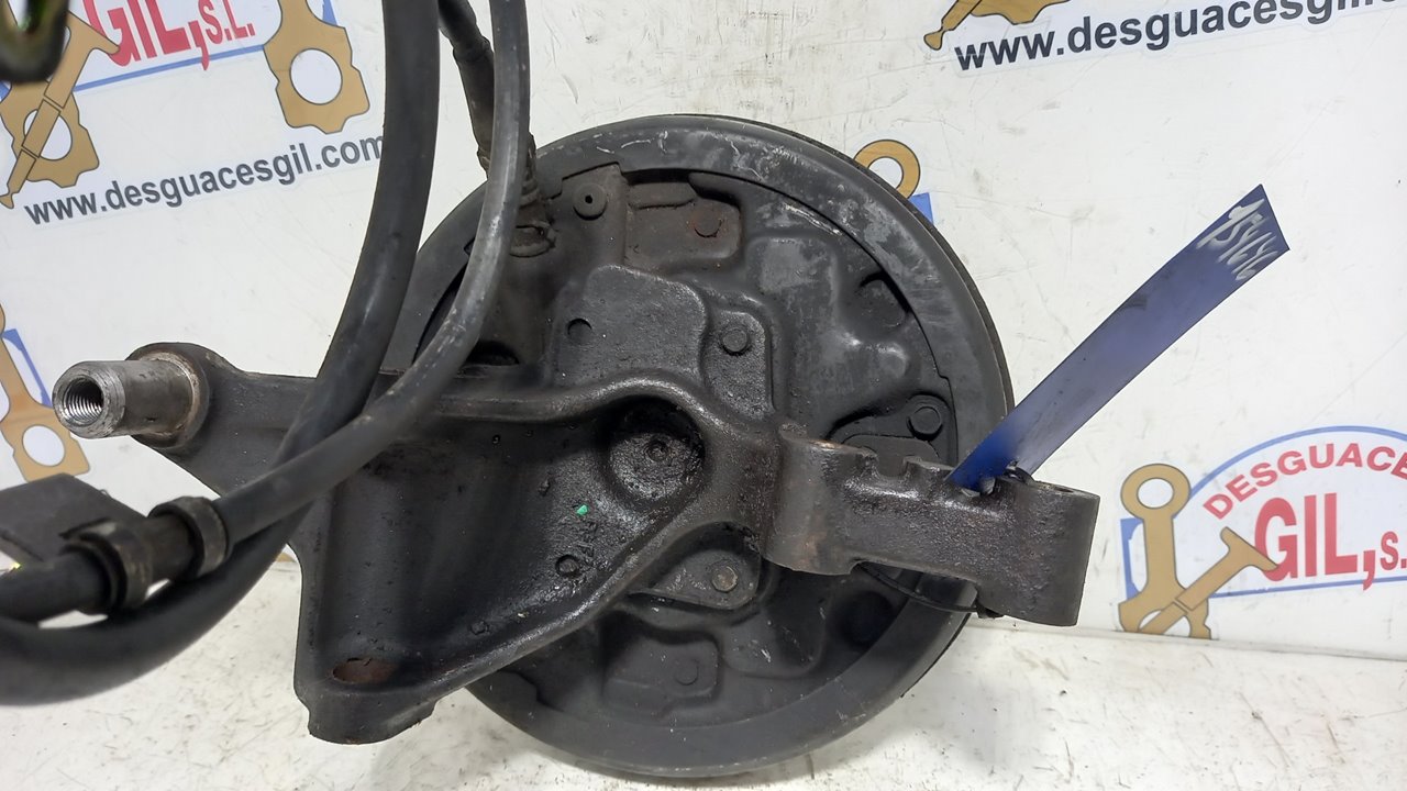 Mangueta trasera derecha ZL de Mazda 323 1998-2001 - pieza usada