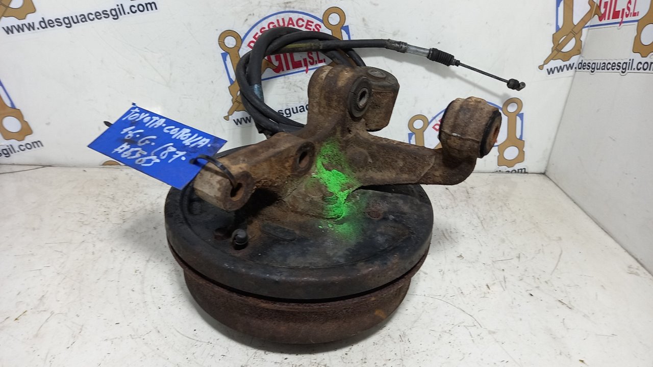 Mangueta trasera izquierda GASOLINA de Toyota Corolla 1986-1990 - pieza usada