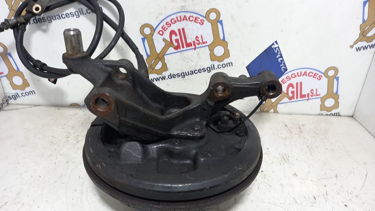 Mangueta trasera derecha ZL de Mazda 323 1998-2001 - pieza usada