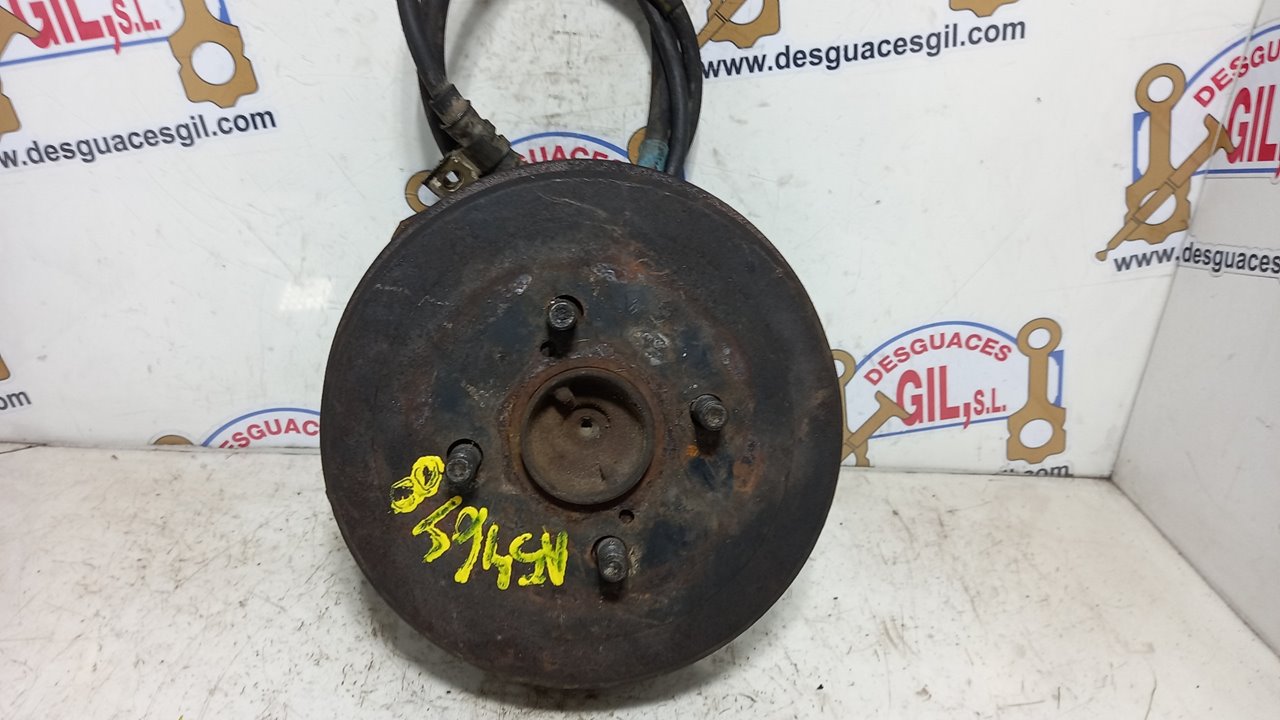 Mangueta trasera izquierda GASOLINA de Toyota Corolla 1986-1990 - pieza usada