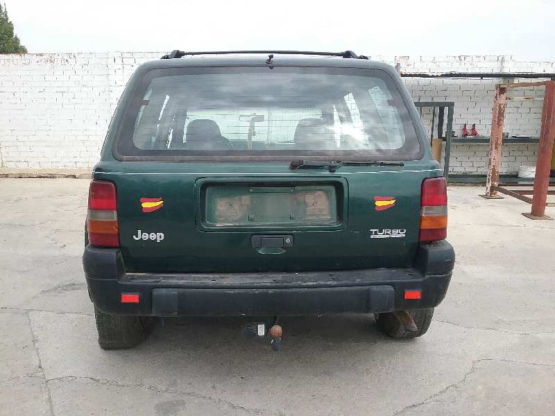 JEEP Grand Cherokee 1 generation (1996-2004) Fönsterlyftare till vänster bak 55154621 25042381