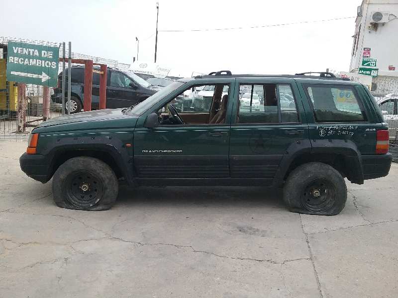 JEEP Grand Cherokee 1 generation (1996-2004) Fönsterlyftare till vänster bak 55154621 25042381