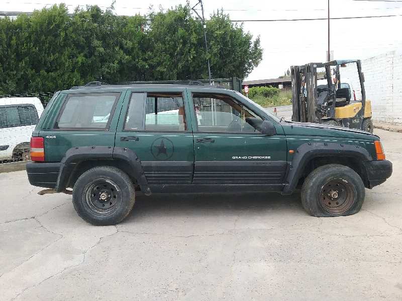 JEEP Grand Cherokee 1 generation (1996-2004) Fönsterlyftare till vänster bak 55154621 25042381