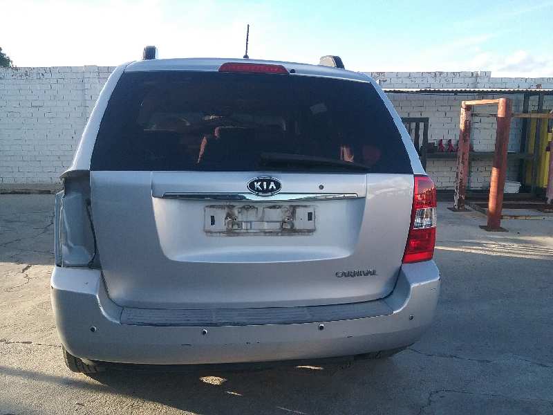 KIA Carnival 2 generation (2006-2010) Bakluckans bagagerumslås 812304D100 25036547