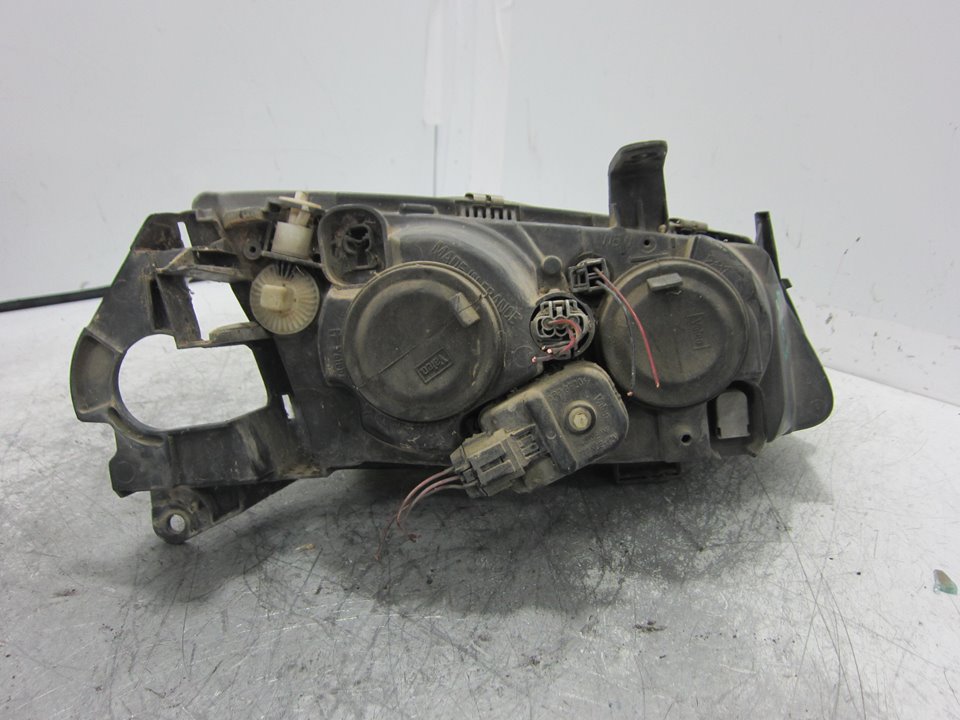 NISSAN Almera N16 (2000-2006) Fram vänster strålkastare 89003331 24935819