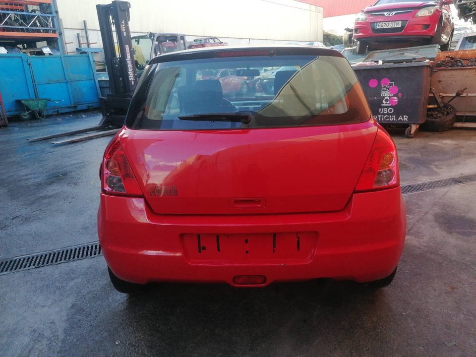 SUZUKI Swift 3 generation (2004-2010) Маторчик стеклоподъемника передней левой двери 8346063J00 23789595