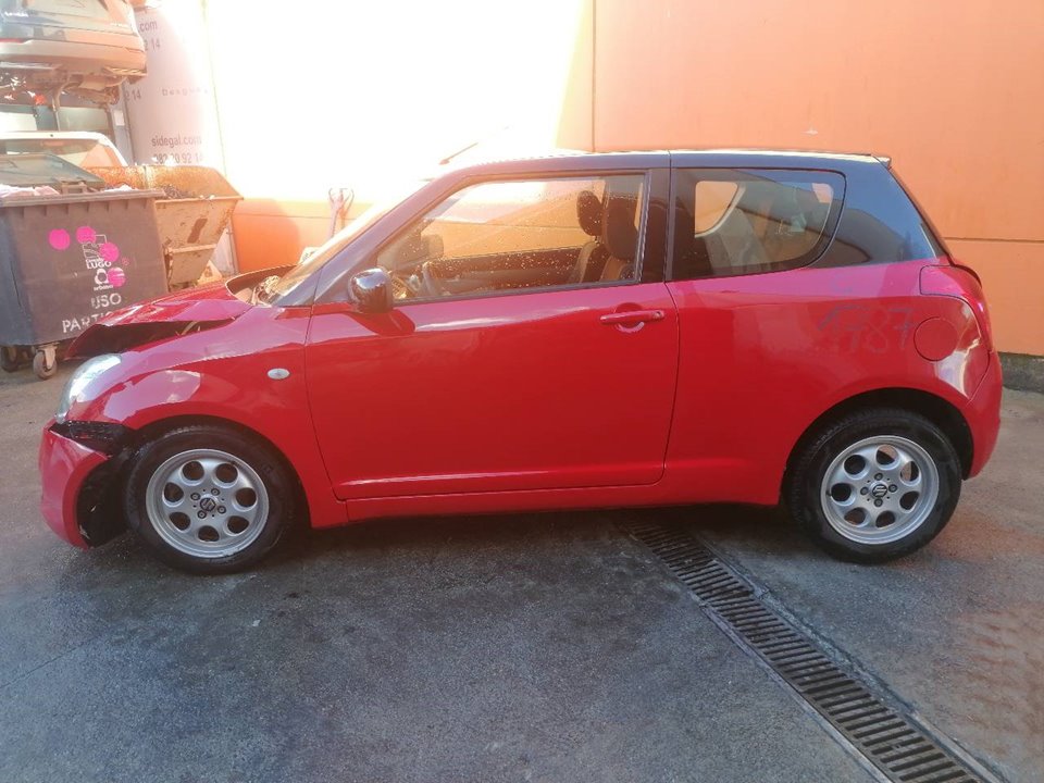 SUZUKI Swift 3 generation (2004-2010) Priekšējo kreiso durvju logu pacēlāja motorīts 8346063J00 23789595